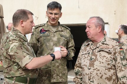 Coalition forces hold a discussion before the defense attaché forum convenes in Baghdad, Iraq, March 17, 2022. The defense attaché forum serves as an opportunity to build-relationships among Global Coalition members, and as a gateway to discuss topics pertaining to the enduring defeat of Da’esh including CJTF-OIR’s progress and areas of needed improvement. (U.S. Army photo by Staff Sgt. Bree-Ann Ramos-Clifton)