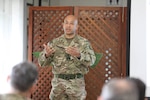 British Brig. Gen. Karl Harris, the deputy commanding general of Combined Joint Task Force – Operation Inherent Resolve (CJTF-OIR), gives opening remarks during the defense attaché forum in Baghdad, Iraq, March 17, 2022. The defense attaché forum serves as an opportunity to build relationships among Global Coalition members, and as a gateway to discuss topics pertaining to the enduring defeat of Da’esh including CJTF-OIR’s progress and areas of needed improvement. (U.S. Army photo by Staff Sgt. Bree-Ann Ramos-Clifton)