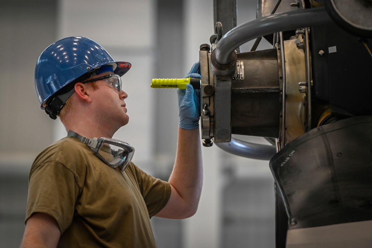 U.S. Air Force Staff Sgt. Johnathon Brace, 103rd Maintenance Squadron aerospace propulsion technician, inspects a C-130H Hercules propeller during a propeller change at Bradley Air National Guard Base in East Granby, Connecticut, July 21, 2021. Aerospace propulsion Airmen test, maintain and repair all parts of the engines and propellers and play a critical role in maintaining mission readiness for the 103rd Airlift Wing’s C-130H Hercules fleet.