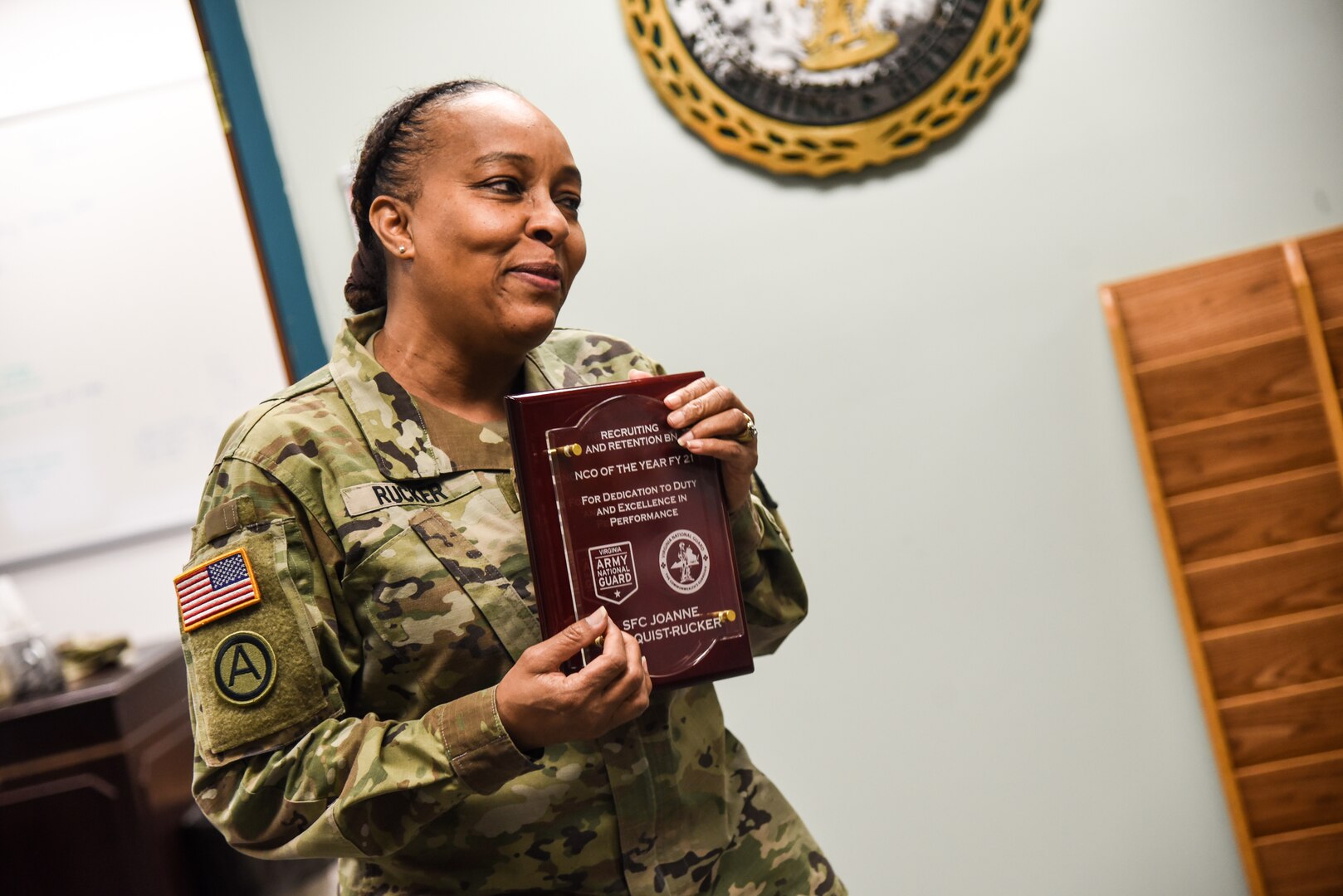 The Virginia Army National Guard’s Recruiting and Retention Battalion recognizes Sgt. 1st Class Jo-Ann Lindquist-Rucker as the battalion’s Noncommissioned Officer of the Year for 2021 during a small ceremony held March 15, 2022, at Fort Pickett, Virginia. Lindquist-Rucker serves as the battalion’s senior supply sergeant. (U.S. Army National Guard photo Sgt. 1st Class Terra C. Gatti)