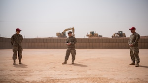 Capt. Ericka Bitz, 557th Expeditionary Red Horse Squadron officer-in-charge, addresses the crowd at a munitions storage area expansion ribbon cutting ceremony at Prince Sultan Air Base, Kingdom of Saudi Arabia, March 16, 2022. The expansion of the munitions storage area greatly increases the lethality of the U.S. Air Forces in the region by progressing the fortification of the base’s facilities and allowing more weapons to be safely stored at PSAB (U.S. Air Force photo by Senior Airman Jacob B. Wrightsman)