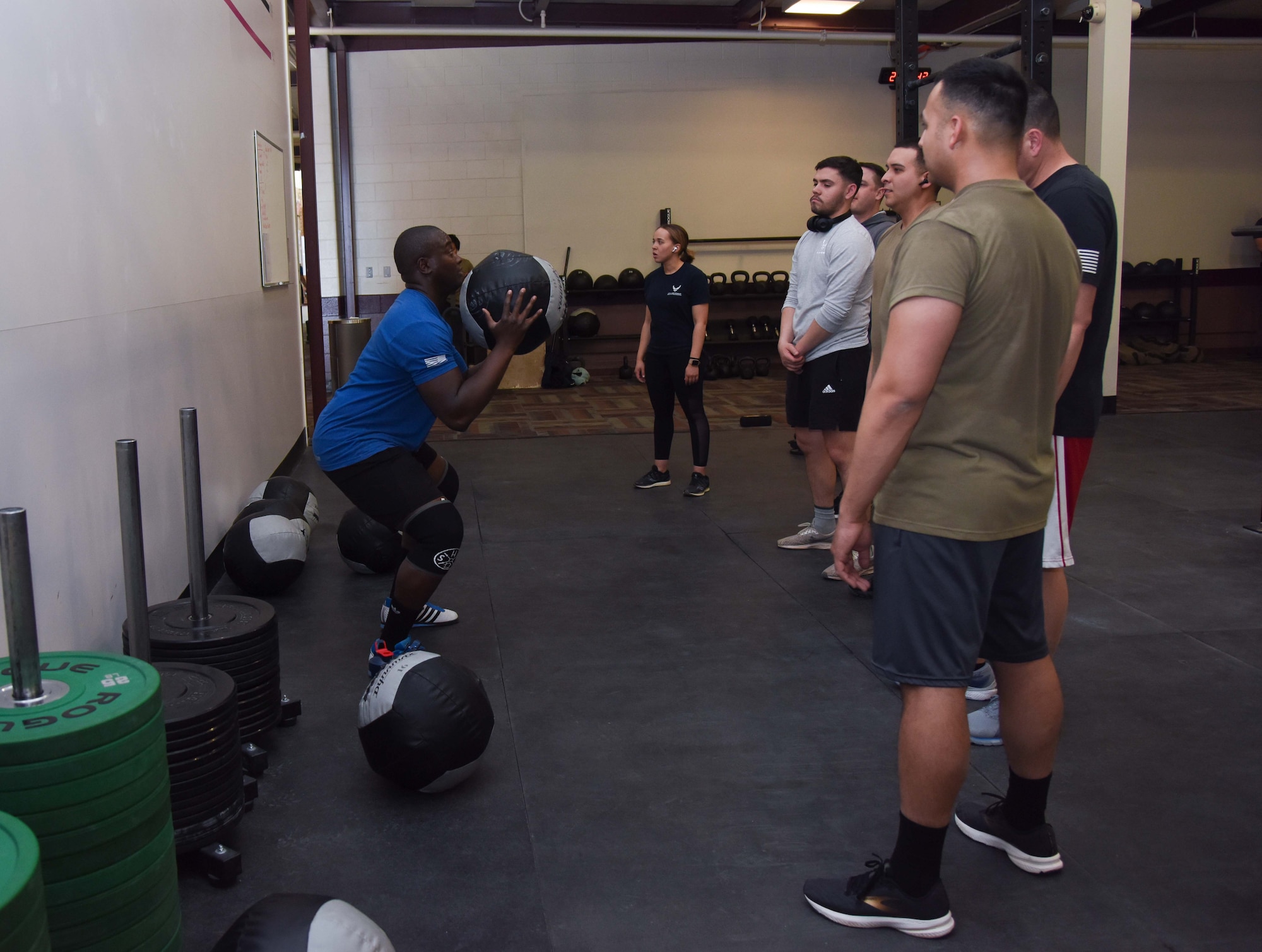 Group of people working out in gym