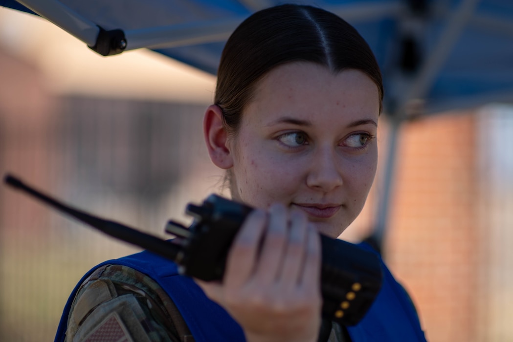 U.S. Air Force Senior Airman Kyrstin Korte 375th Logistics Readiness Squadron personal property technician, ensures cargo is properly in-checked on Scott Air Force Base, Illinois, March 16, 2022. Korte, a wing inspection team member for the readiness rehearsal, evaluated how ground transportation procedures were executed. (U.S. Air Force photo by Airman 1st Class Violette Hosack)