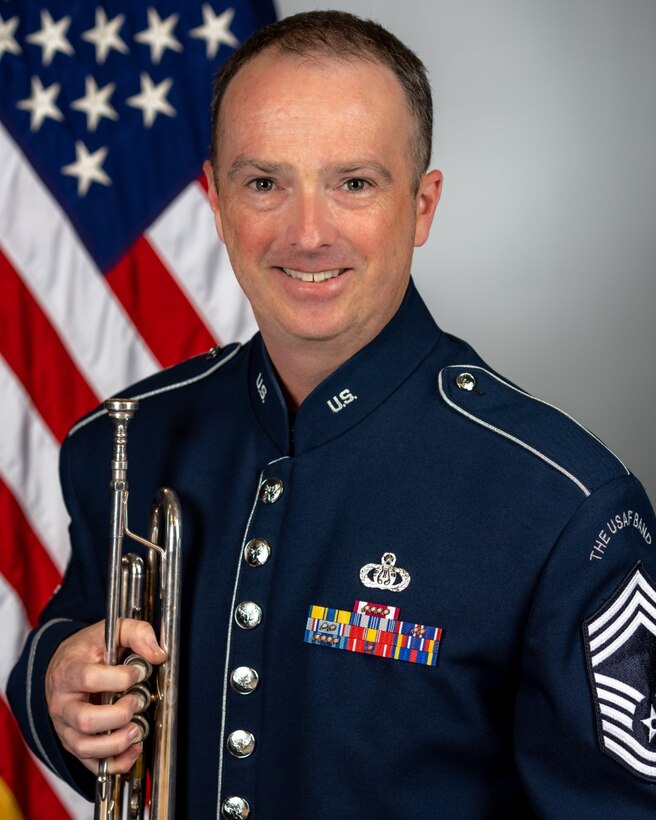 Official Photo of CMSgt Brian MacDonald (with trumpet)