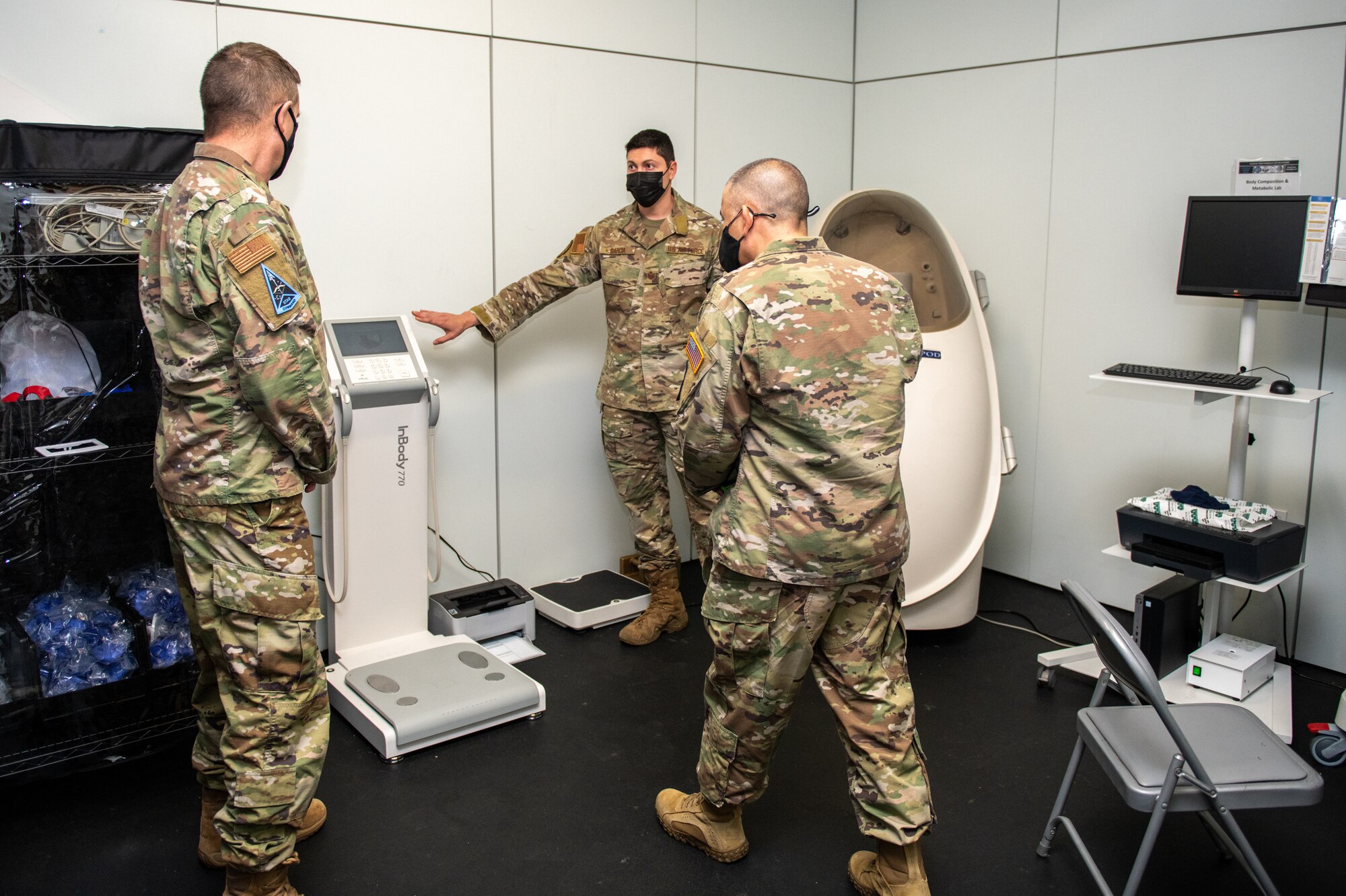U.S. Air Force Tech. Sgt. Jose Garcia (left), Special Warfare Training Wing, diet therapy technician, briefs U.S. Space Force Brig. Gen. Shawn N. Bratton (right), Commander, Space Training and Readiness Command during his visit to the SWTW, Feb. 16, 2022, Joint Base San Antonio-Chapman Annex, Texas. The STARCOM senior leaders learned how the SWTW combines research, technology integration, strength and conditioning, performance nutrition, physical and occupational therapy, and psychology into the Air Force Special Warfare training pipeline. (U.S. Air Force photo by Thomas Coney).