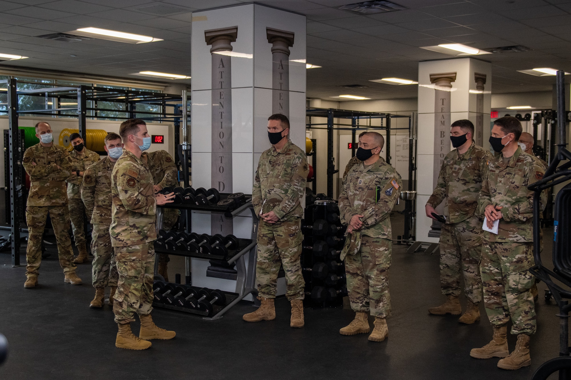 U.S. Air Force Tech. Sgt. Ryan Smith (left), Special Warfare Training Wing, physical medicine technician, briefs U.S. Space Force Brig. Gen. Shawn N. Bratton (center right), Commander, Space Training and Readiness Command and Chief Master Sgt. James P. Seballes (left), Space Training and Readiness Command, senior enlisted leader, during their visit to the SWTW, Feb. 16, 2022, Joint Base San Antonio-Chapman Annex, Texas. The STARCOM senior leaders learned how the SWTW combines research, technology integration, strength and conditioning, performance nutrition, physical and occupational therapy, and psychology into the Air Force Special Warfare training pipeline. (U.S. Air Force photo by Thomas Coney).