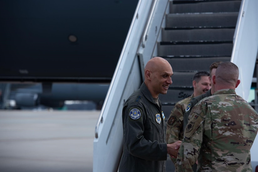 Lt. Gen. Brian Robinson shakes hand of service member