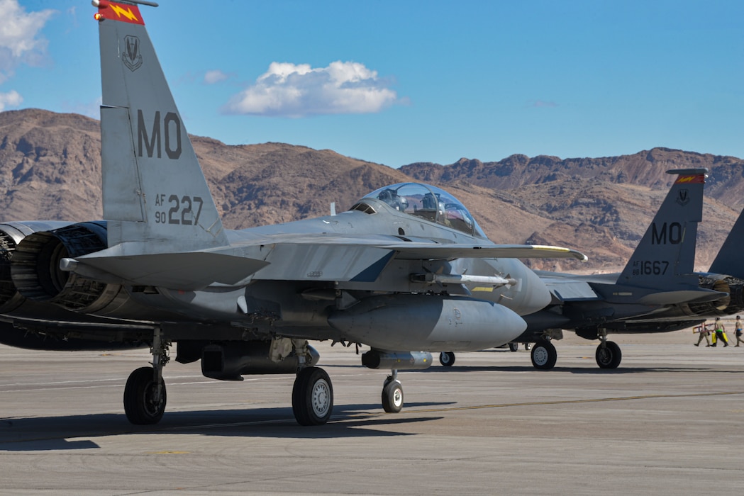 U.S. Air Force F-15E Strike Eagles from the 389th Fighter Squadron, Mountain Home Air Force Base, Idaho, taxi for takeoff as part of Red Flag-Nellis 22-2 on Nellis Air Force Base, Nevada, March 7, 2022. Red Flag provides several realistic training scenarios that saves lives while increasing combat effectiveness. (U.S. Air Force photo by Staff Sgt. Austin Siegel)