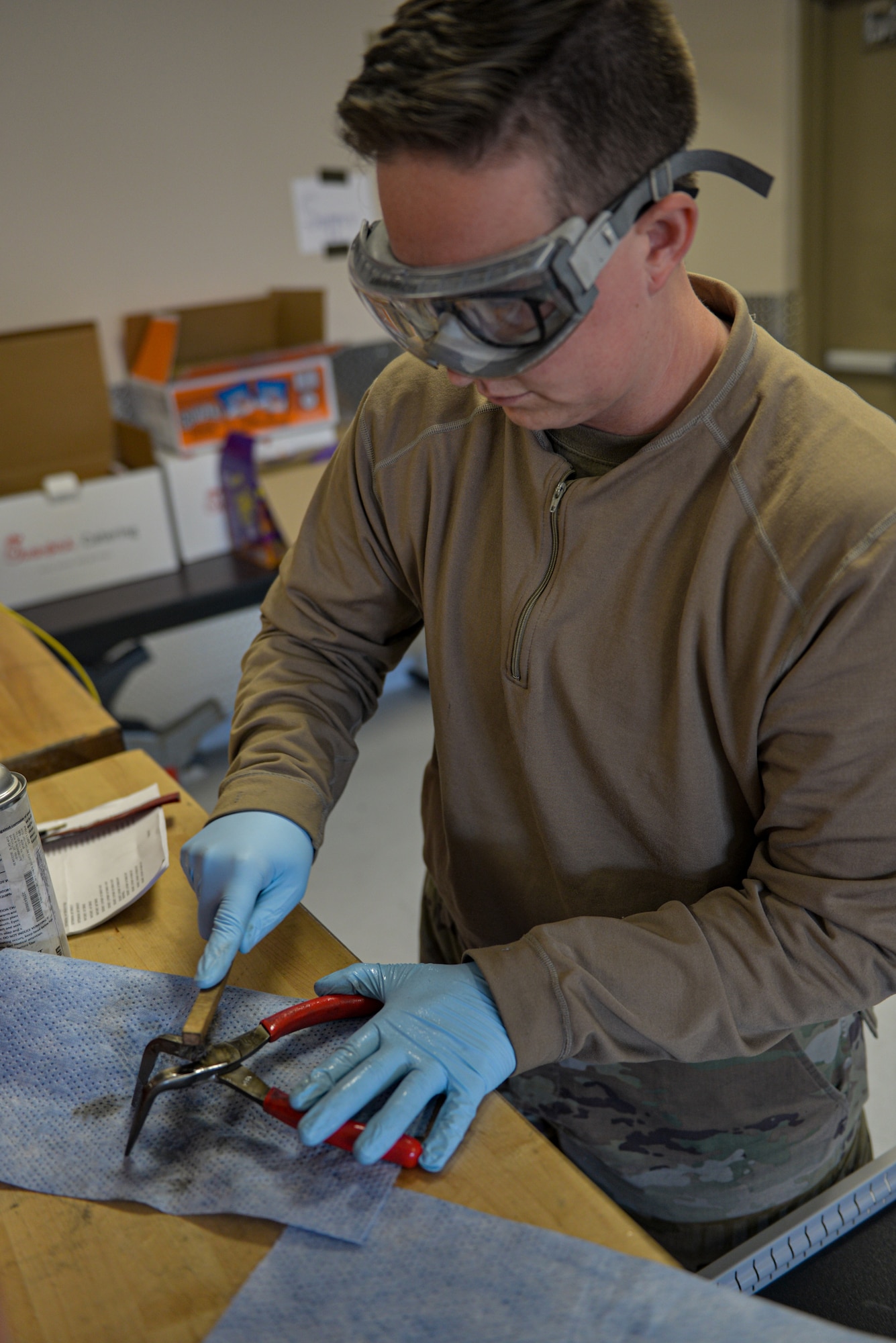 An Airman performs a “180 day” inspection on tools.