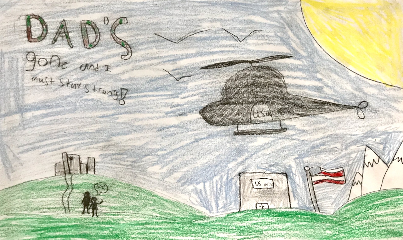 A child's drawing of the sun, a helicopter and buildings with the words: Dad's gone and I have to be strong.