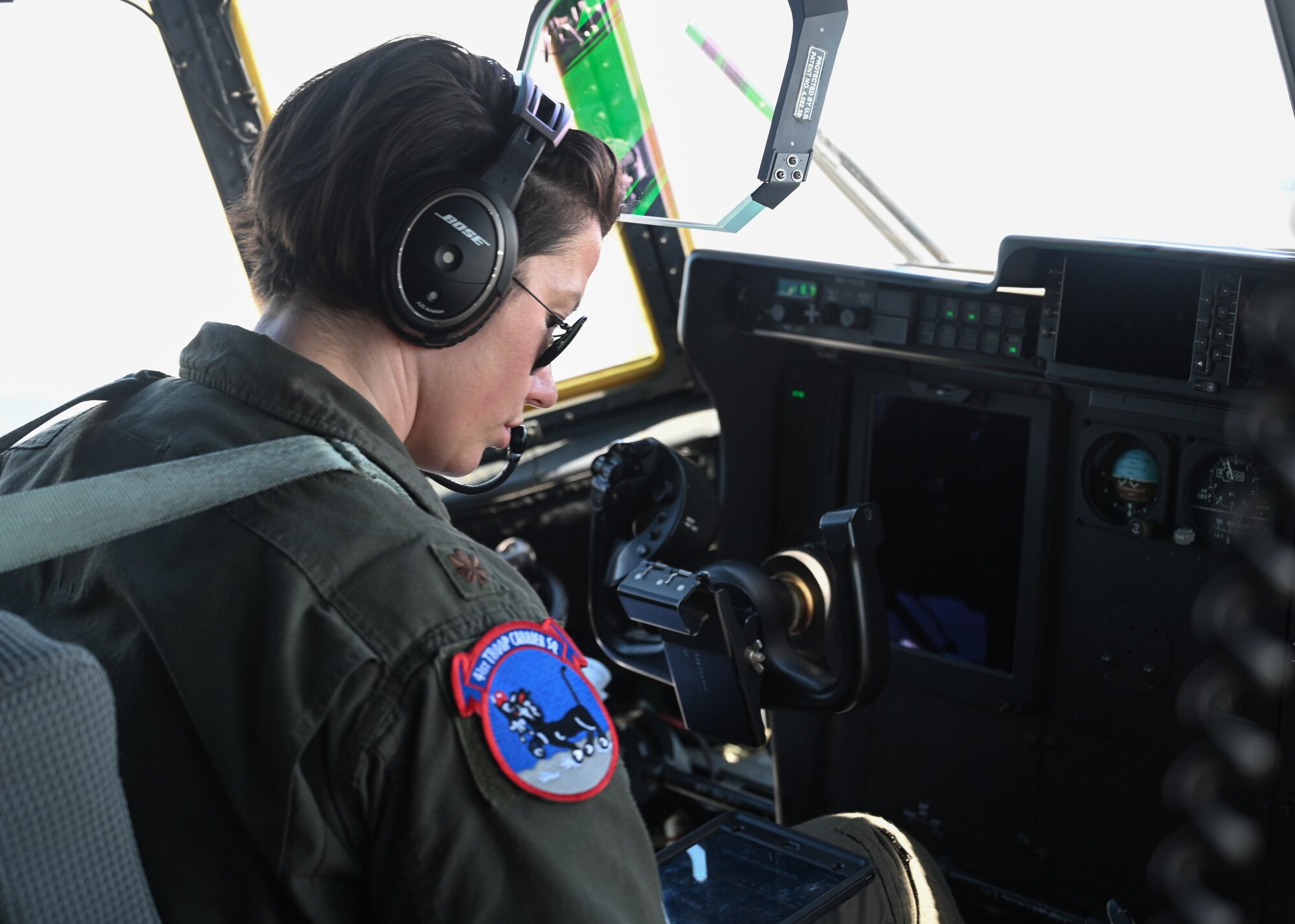 Maj. Laura Dempster, 41st Airlift Squadron C-130J pilot, prepares for takeoff during a ROTC cadet orientation flight