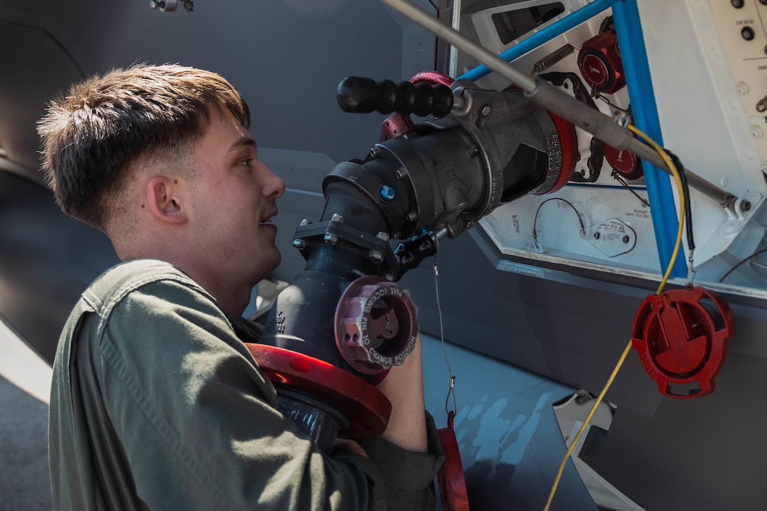 U.S. Marine Corps Cpl. Mazen Peterson, a bulk fuel specialist with Marine Corps Air Station Futenma, Marine Corps Installations Pacific, conduct hot pit refueling training no Kadena Air Base, March 9, 2022. The training refined and enhanced the multiple aircraft platform skills of participating Marines, focusing on hot-pit refueling the F-35A Lightning II with limited time, simulating an operational environment. During hot-pit refueling, the aircraft maintains a running engine, which decreases the response time in an operational environment. (U.S. Marine Corps photo by Lance Cpl. Jonathan Beauchamp)