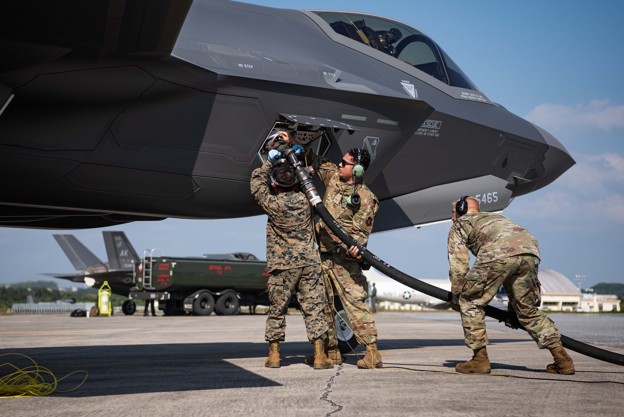 Airmen and Marines conduct hot pit refueling on a F-35A Lightning II.