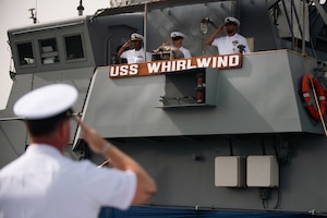 220321-N-KZ419-1332 MANAMA, Bahrain (March 21, 2022) Sailors assigned to patrol coastal ship USS Whirlwind (PC 11) salute during the ship's decommissioning ceremony March 21, at Naval Support Activity Bahrain.