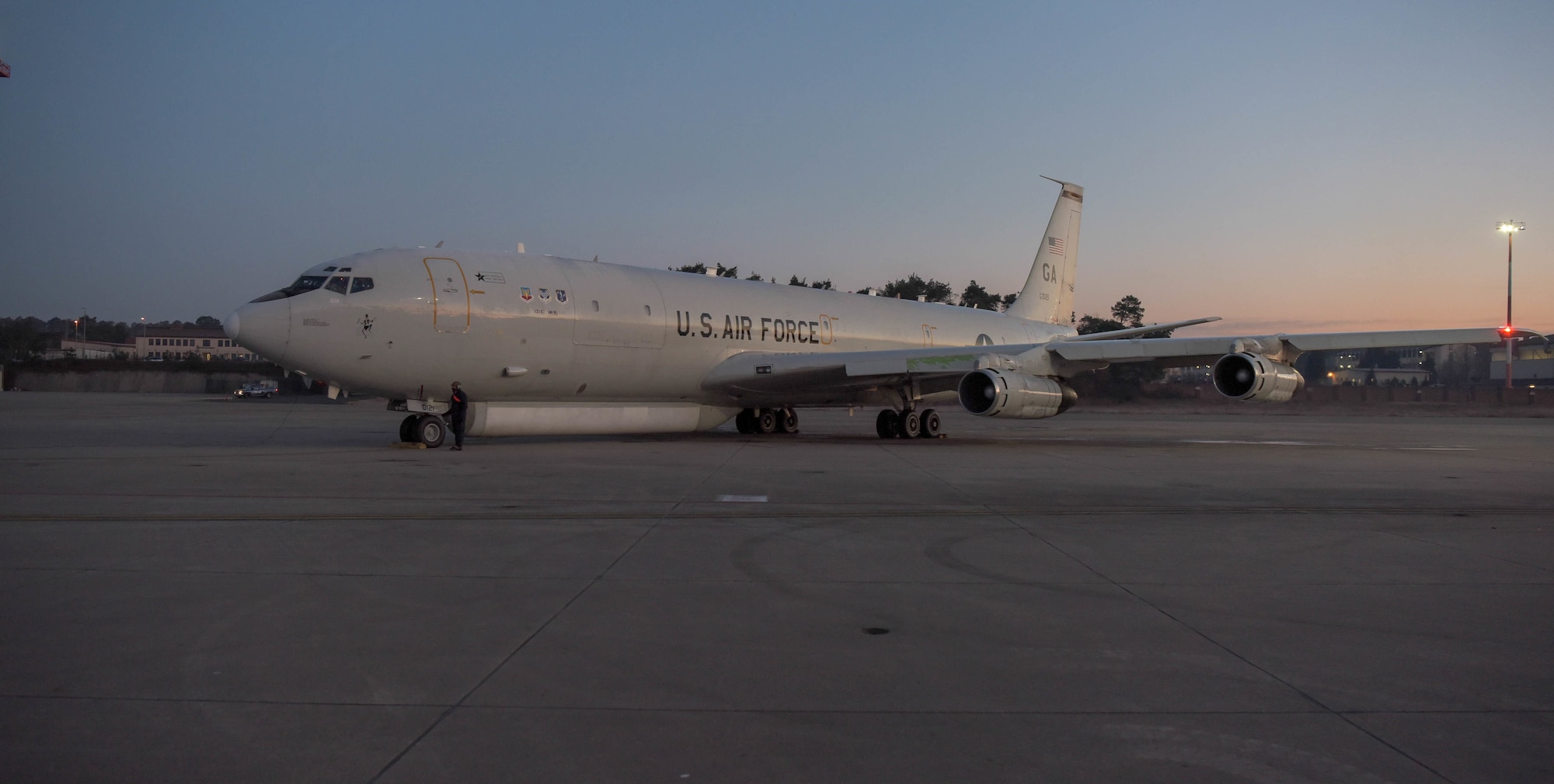 White aircraft on flight line