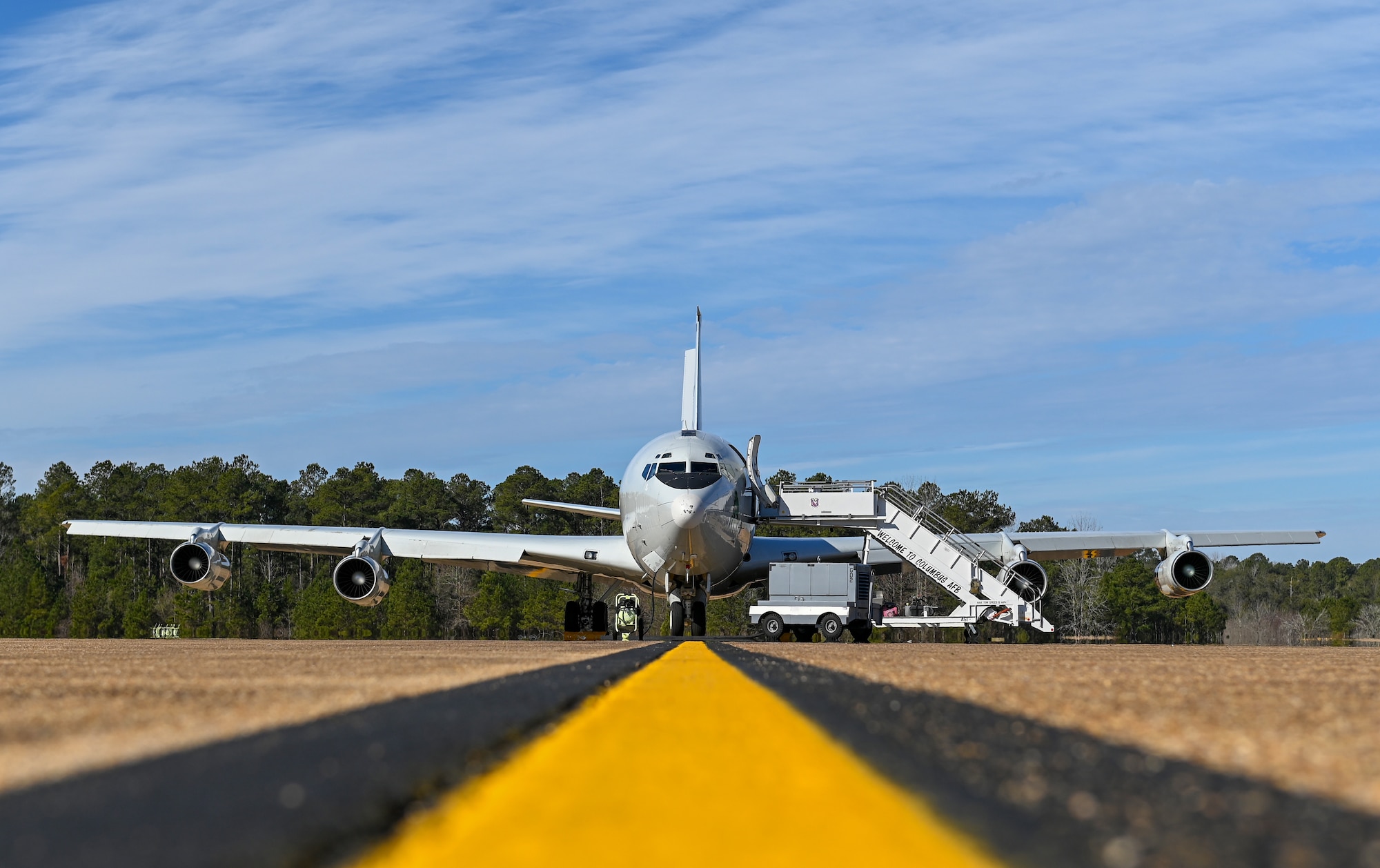 A U.S. Air Force E-8C Joint Stars sits on a flightline for a static display on Feb. 5, 2020, at Columbus Air Force Base, Miss. The E-8C's primary mission is to provide theater ground and air commanders with ground surveillance to  support attack operations and targeting that contributes to the delay, disruption and destruction of enemy forces. (U.S. Air Force photo by Airman 1st Class Davis Donaldson)