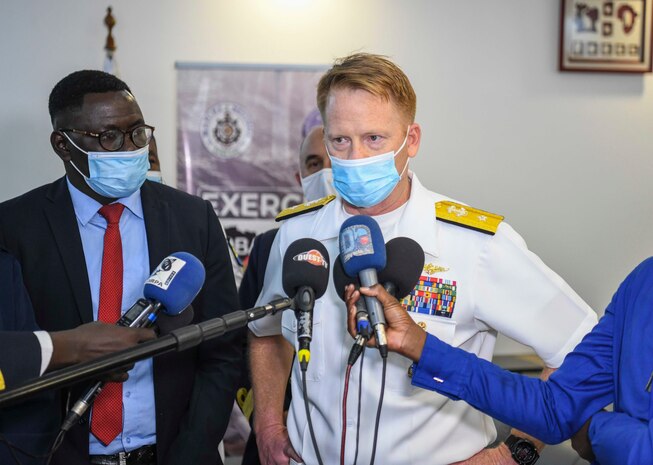 Rear Adm. Benjamin Reynolds, director of Maritime Headquarters, U.S. Naval Forces Europe and Africa, speaks with military and local news outlets during the closing ceremony of Exercise Obangame Express 2022 at the Senegalese Naval Headquarters, in Dakar, Senegal, Mar. 18, 2022.