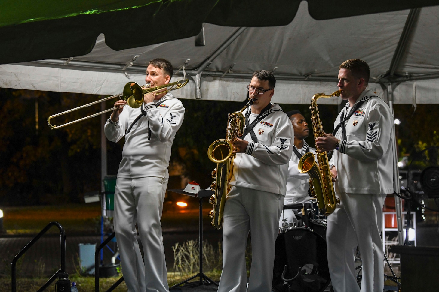 CCRA, Ghana (Mar. 15, 2022) Members of U.S. Naval Forces Europe and Africa band perform a concert in at the U.S. Ambassador to Ghana house for U.S. and Ghana Security Cooperation reception in Accra, Ghana as part of Exercise Obangame Express 2022, Mar. 15, 2022.