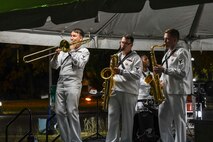 CCRA, Ghana (Mar. 15, 2022) Members of U.S. Naval Forces Europe and Africa band perform a concert in at the U.S. Ambassador to Ghana house for U.S. and Ghana Security Cooperation reception in Accra, Ghana as part of Exercise Obangame Express 2022, Mar. 15, 2022.