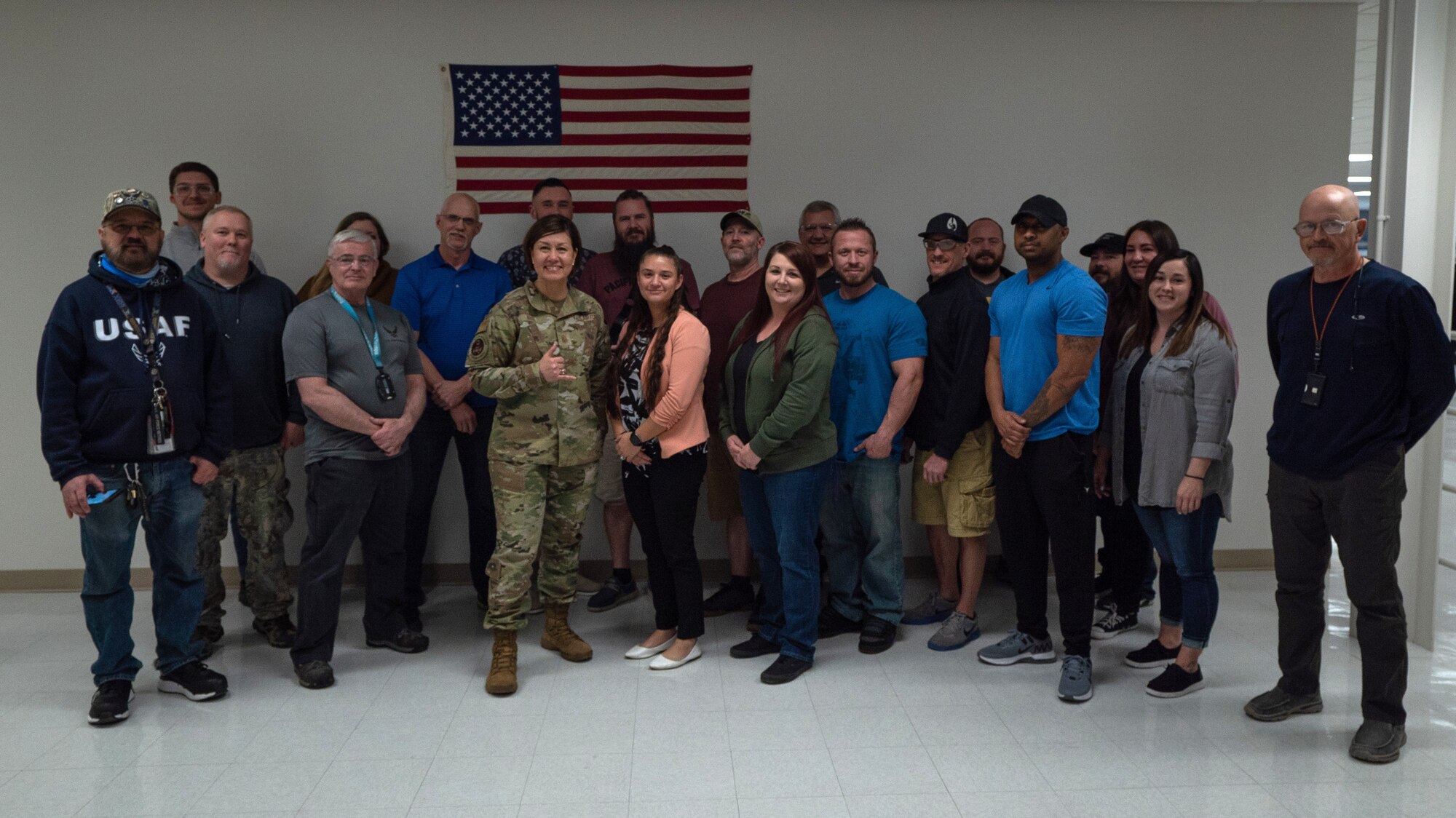 Chief Master Sergeant of the Air Force JoAnne S. Bass poses for a group photo with members of the squadron.
