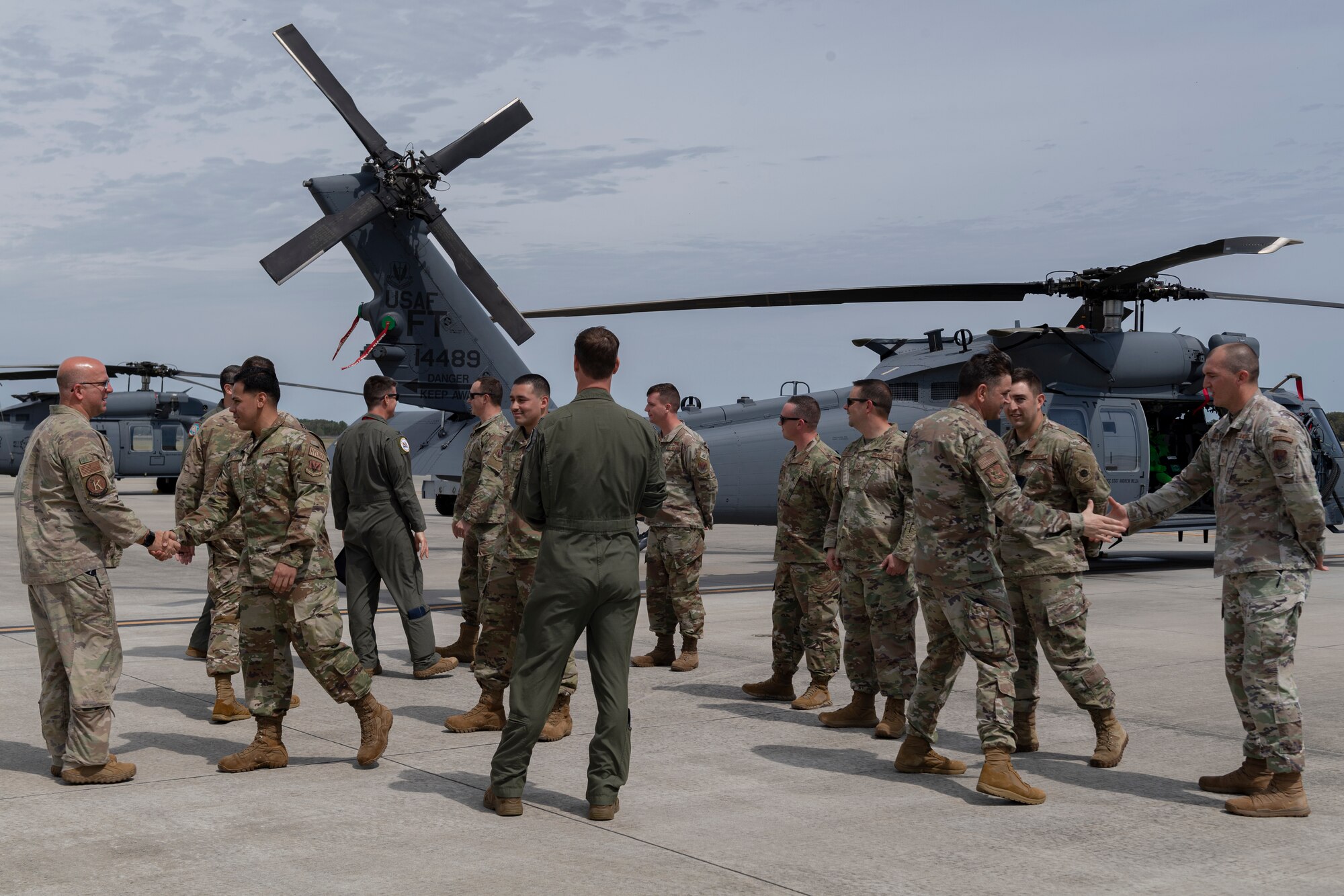 Photo of leadership greeting Airmen
