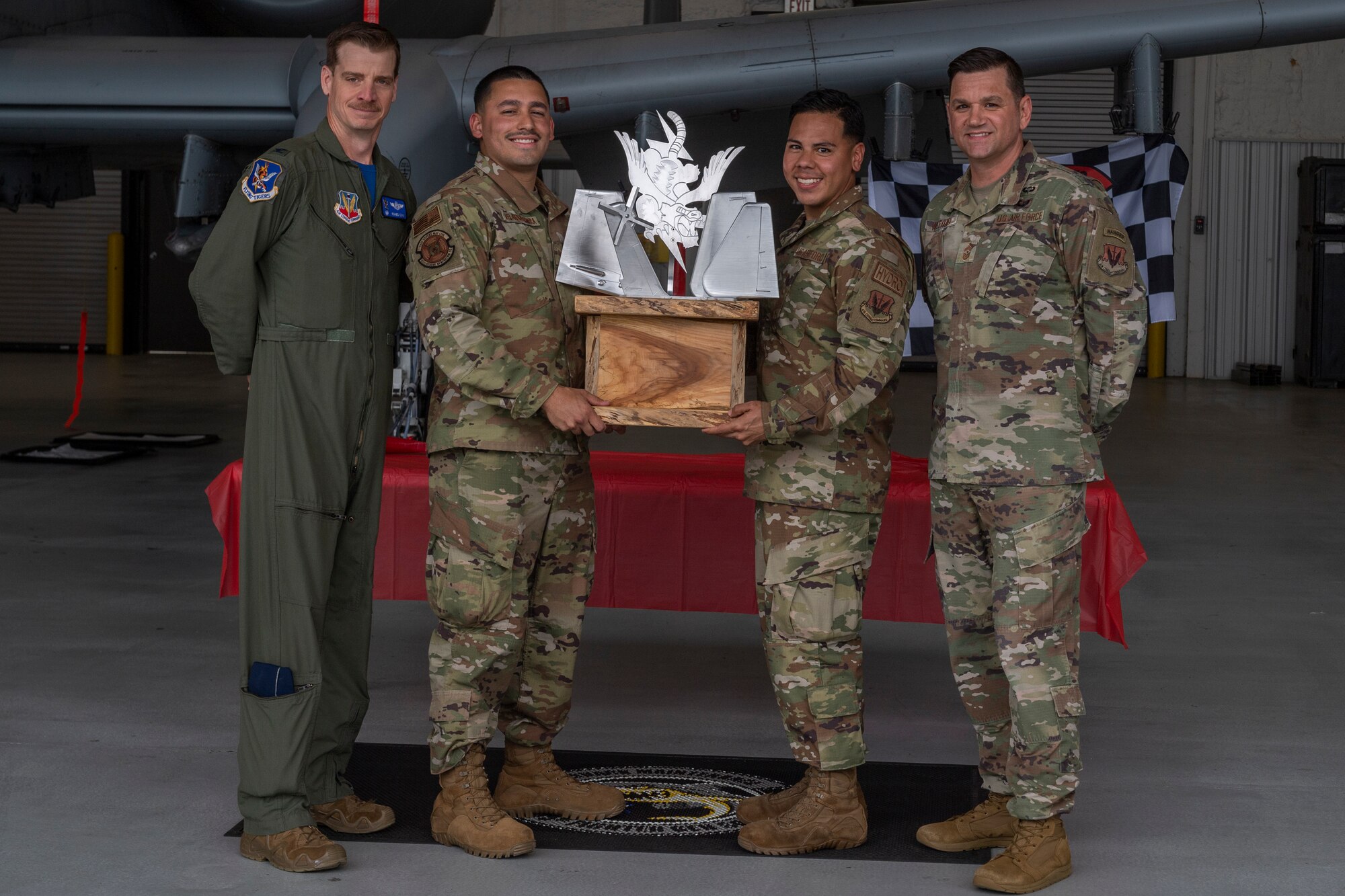Photo of Airmen receiving an award
