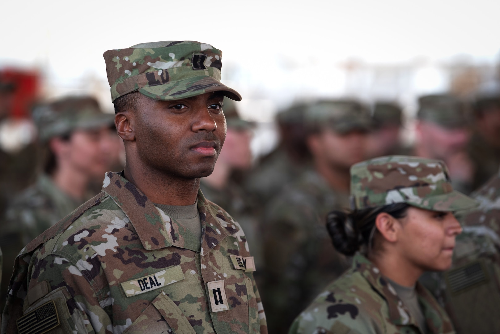 U.S. Illinois Army National Guard Capt. Aaron Deal, 404th Maneuver Enhancement Brigade, waits to receive his combat patch, a military milestone earned while serving in hostile conditions, March 17, 2022.