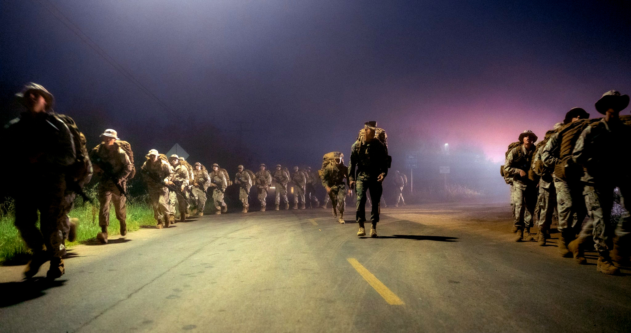 U.S. Marine Corps recruits with Mike Company, 3rd Recruit Training Battalion, participate in a 5K hike during grass week at Marine Corps Base Camp Pendleton, Calif., March 15, 2022.