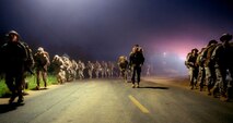 U.S. Marine Corps recruits with Mike Company, 3rd Recruit Training Battalion, participate in a 5K hike during grass week at Marine Corps Base Camp Pendleton, Calif., March 15, 2022.