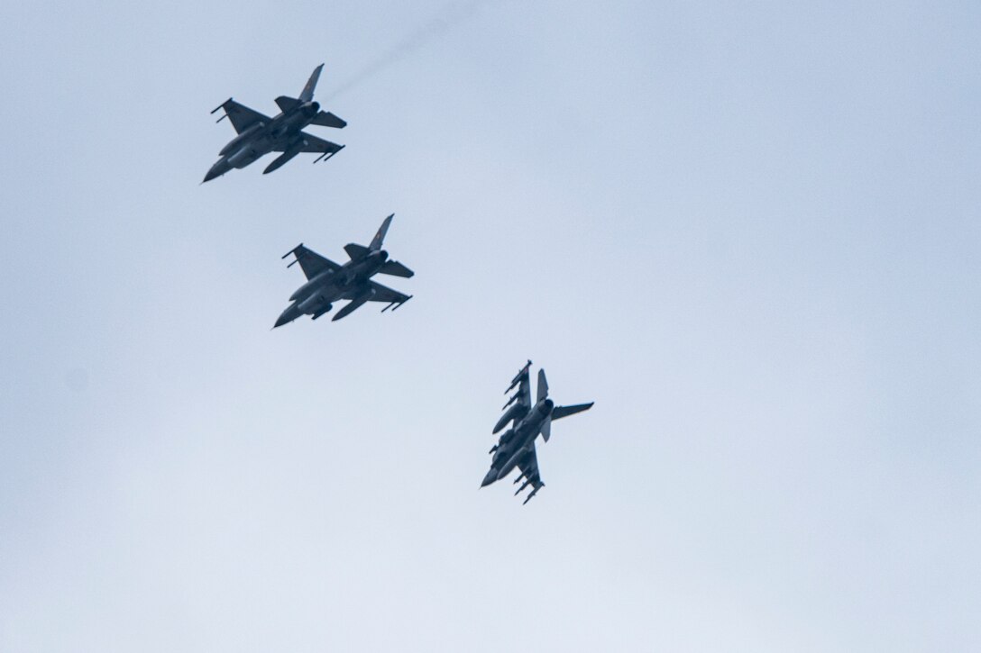 Three jets zoom in the sky.