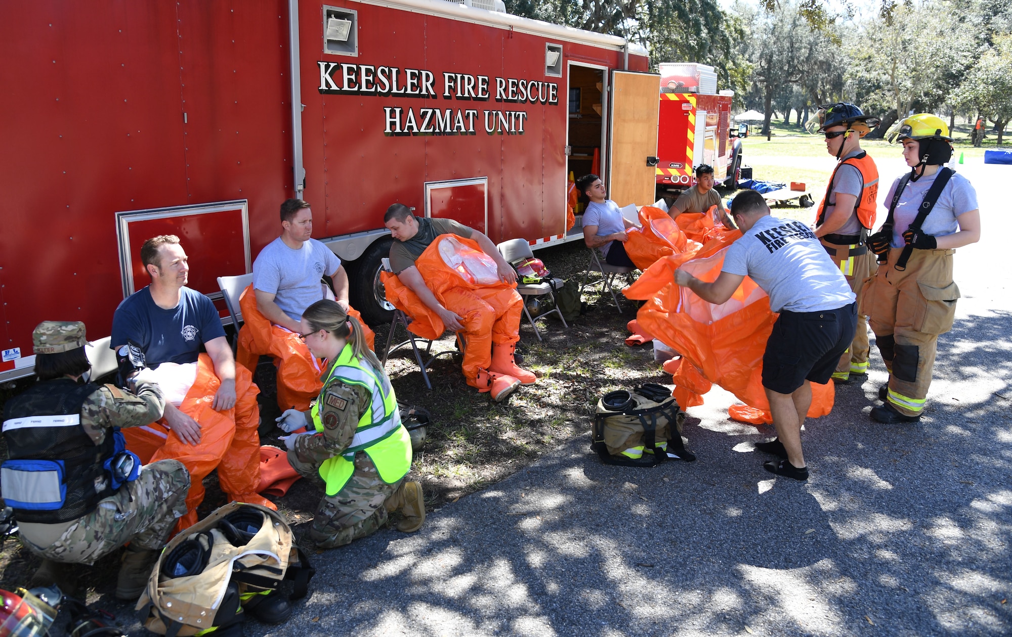 Keesler first responders prepare to retrieve simulated victims from the contaminated area during an Antiterrorism, Force Protection and Chemical, Biological, Radiological, Nuclear exercise at Keesler Air Force Base, Mississippi, March 17, 2022. The exercise tested the base's ability to respond to and recover from a mass casualty event. (U.S. Air Force photo by Kemberly Groue)