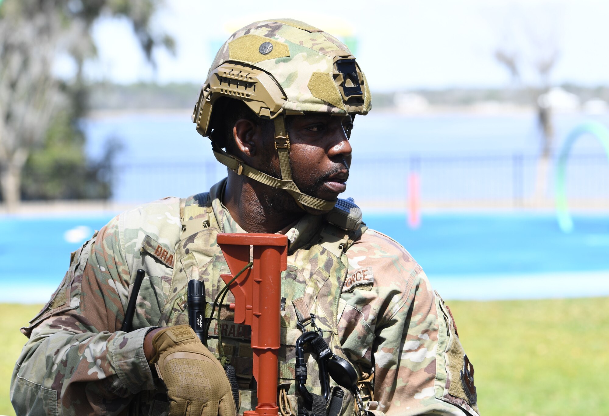 U.S. Air Force Staff Sgt. Quincy Bradley, 81st Security Forces Squadron patrolman, secures the area during an Antiterrorism, Force Protection and Chemical, Biological, Radiological, Nuclear exercise at Keesler Air Force Base, Mississippi, March 17, 2022. The exercise tested the base's ability to respond to and recover from a mass casualty event. (U.S. Air Force photo by Kemberly Groue)