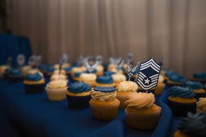 A cupcake with the Chief Master Sergeant insignia sits on a decorative snack table during a Chief Recognition Ceremony at Martin’s Crosswinds in Greenbelt, Md., March 18, 2022.