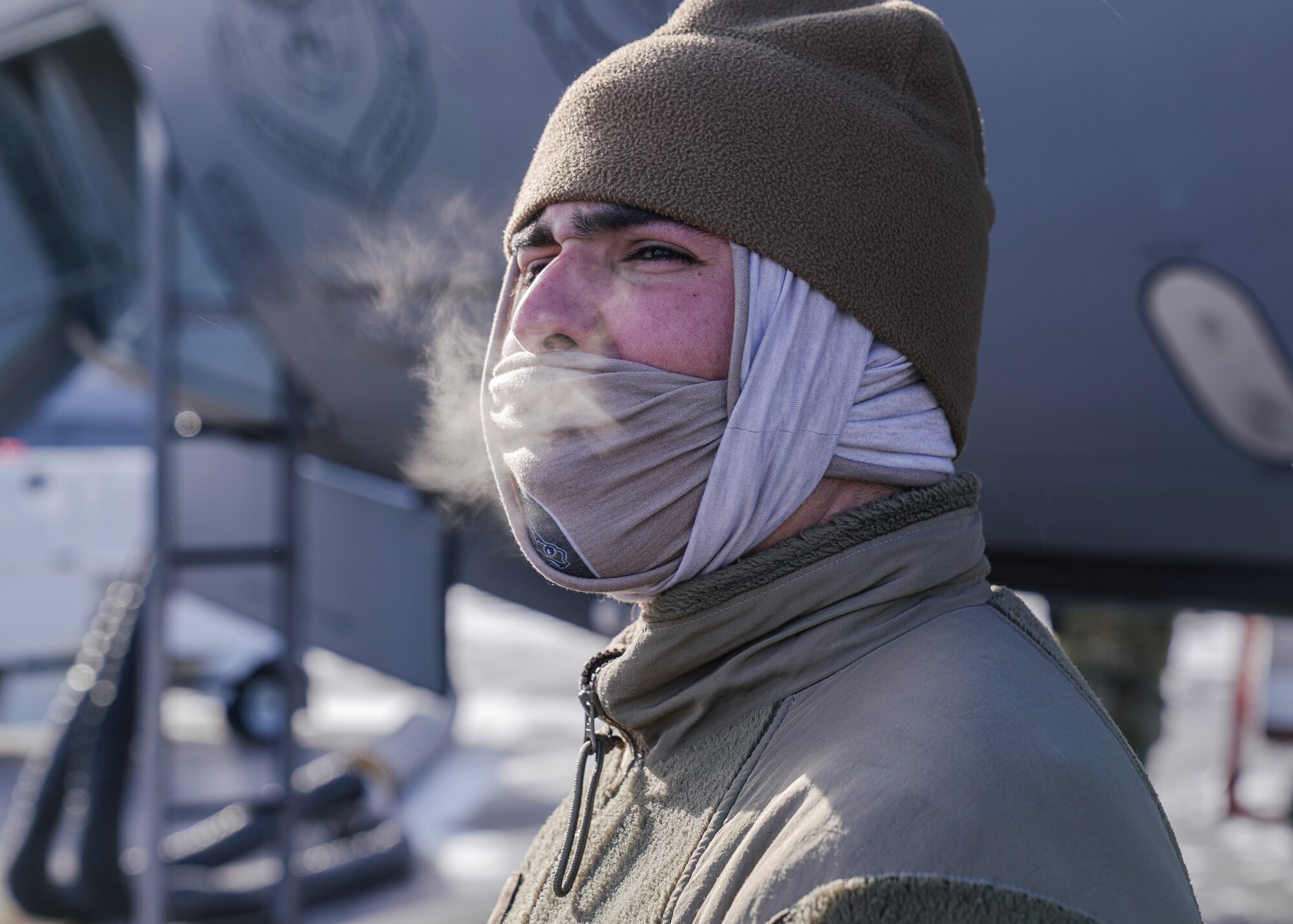 U.S. Air Force Airman 1st Class Aviles Adames, 6th Maintenance Squadron crew chief ,adjusts to the cold-weather climate during North American Aerospace Defense Command's (NORAD) Operation Noble Defender (OND), March 15, 2022.
