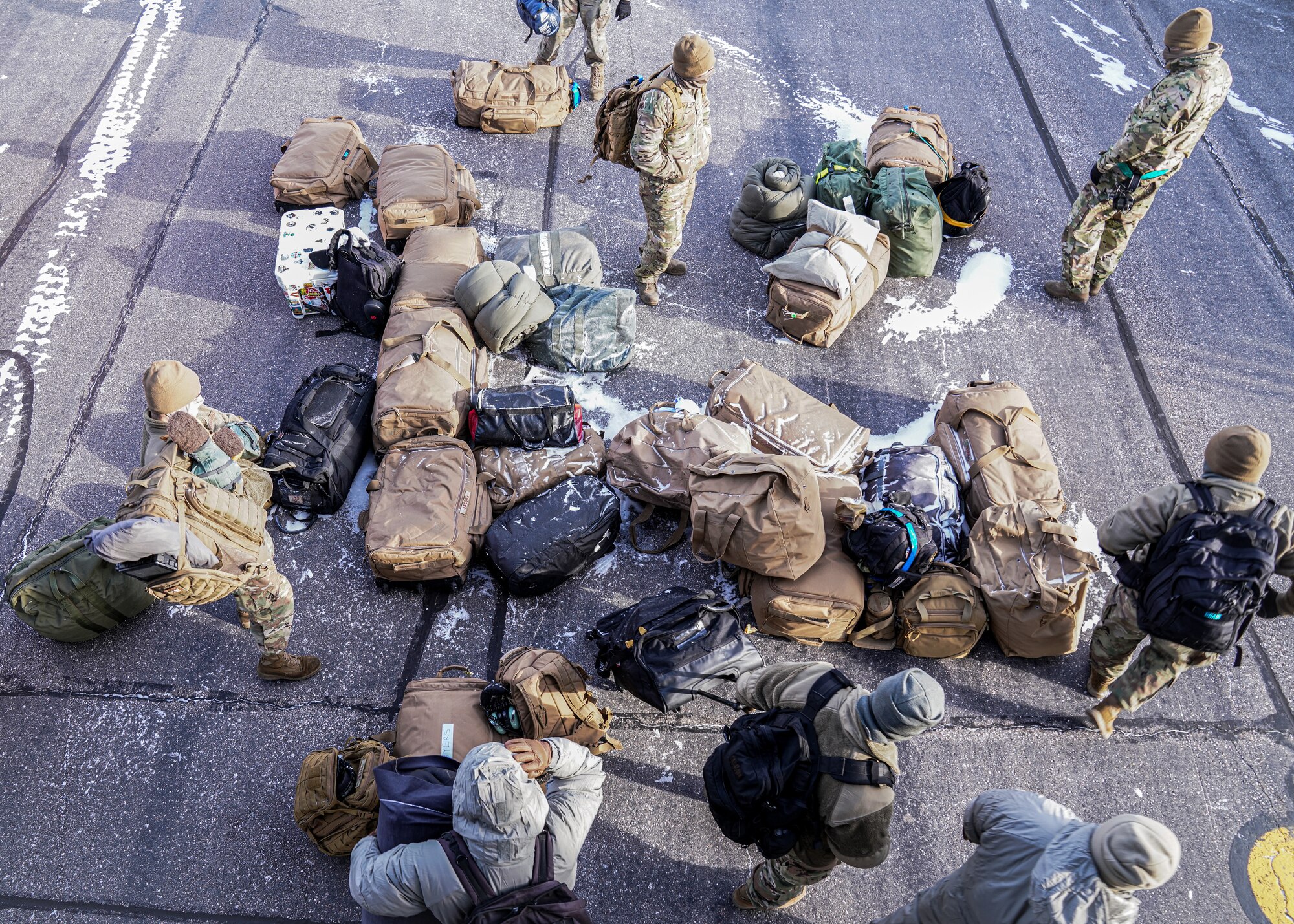 Members assigned to the 6th Air Refueling Wing unload cargo from a KC-135 Stratotanker aircraft during North American Aerospace Defense Command's (NORAD) Operation Noble Defender (OND), March 15, 2022.