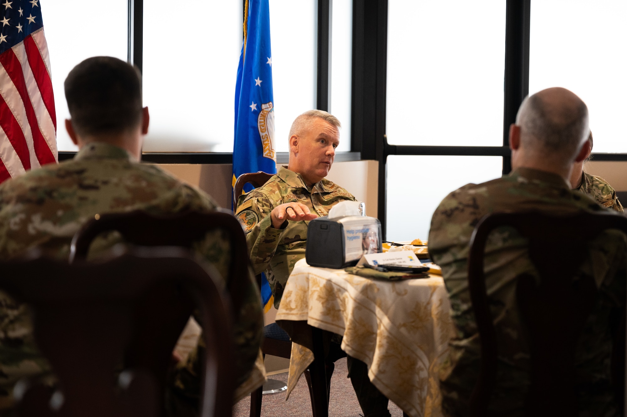 U.S. Air Force Lt. Gen. James Jacobson, U.S. Pacific Air Forces deputy commander, speaks with 354th Fighter Wing and 168th Wing leadership during a visit to Eielson Air Force Base, Alaska, March 9, 2022.