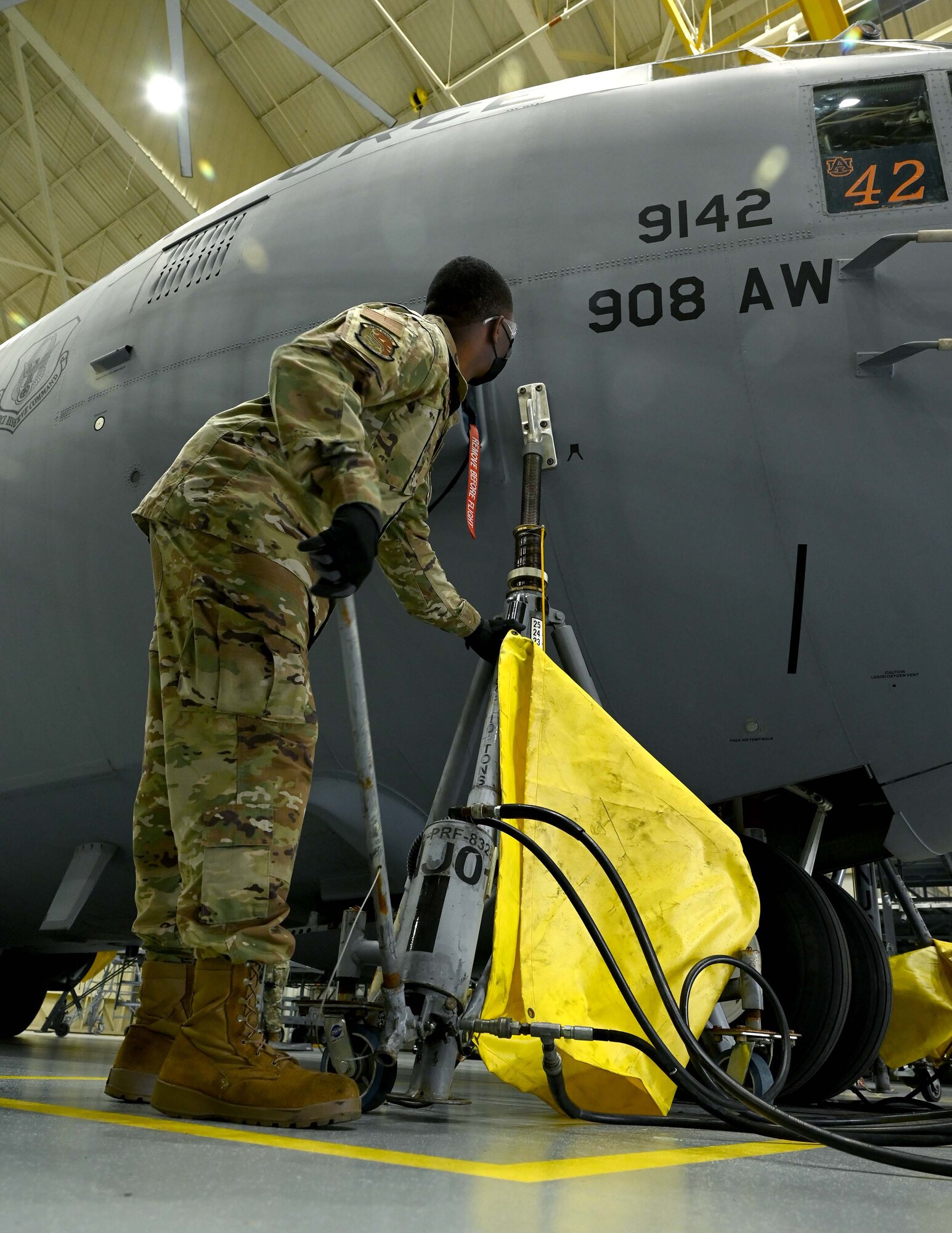 a man uses a fuselage jack