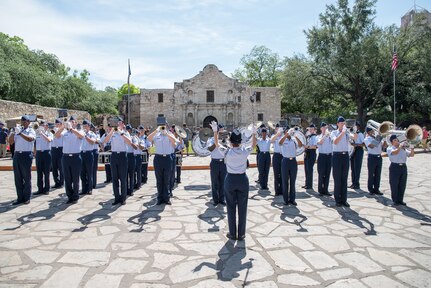 Joint Base San Antonio-Lackland Drum and Bugle Corps, comprised of JBSA-Lackland basic military trainees perform at the San Antonio Fiesta 2017 April 24 during Air Force Day at the Alamo