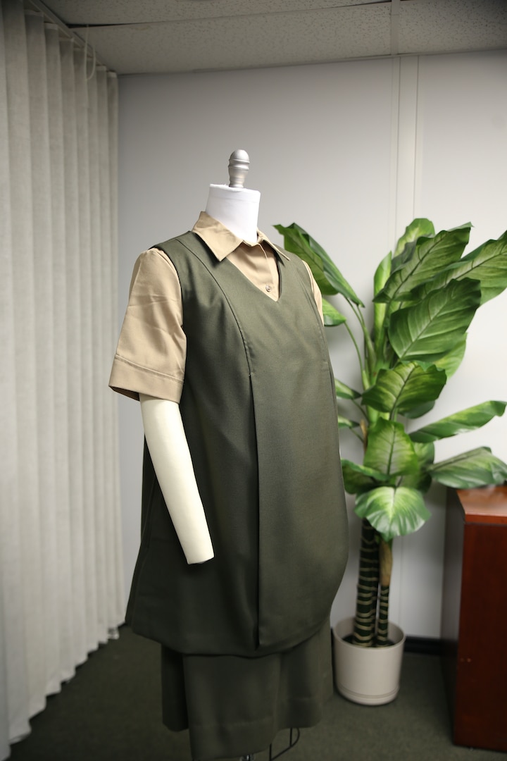 Marine Corps maternity dress uniform on a mannequin.