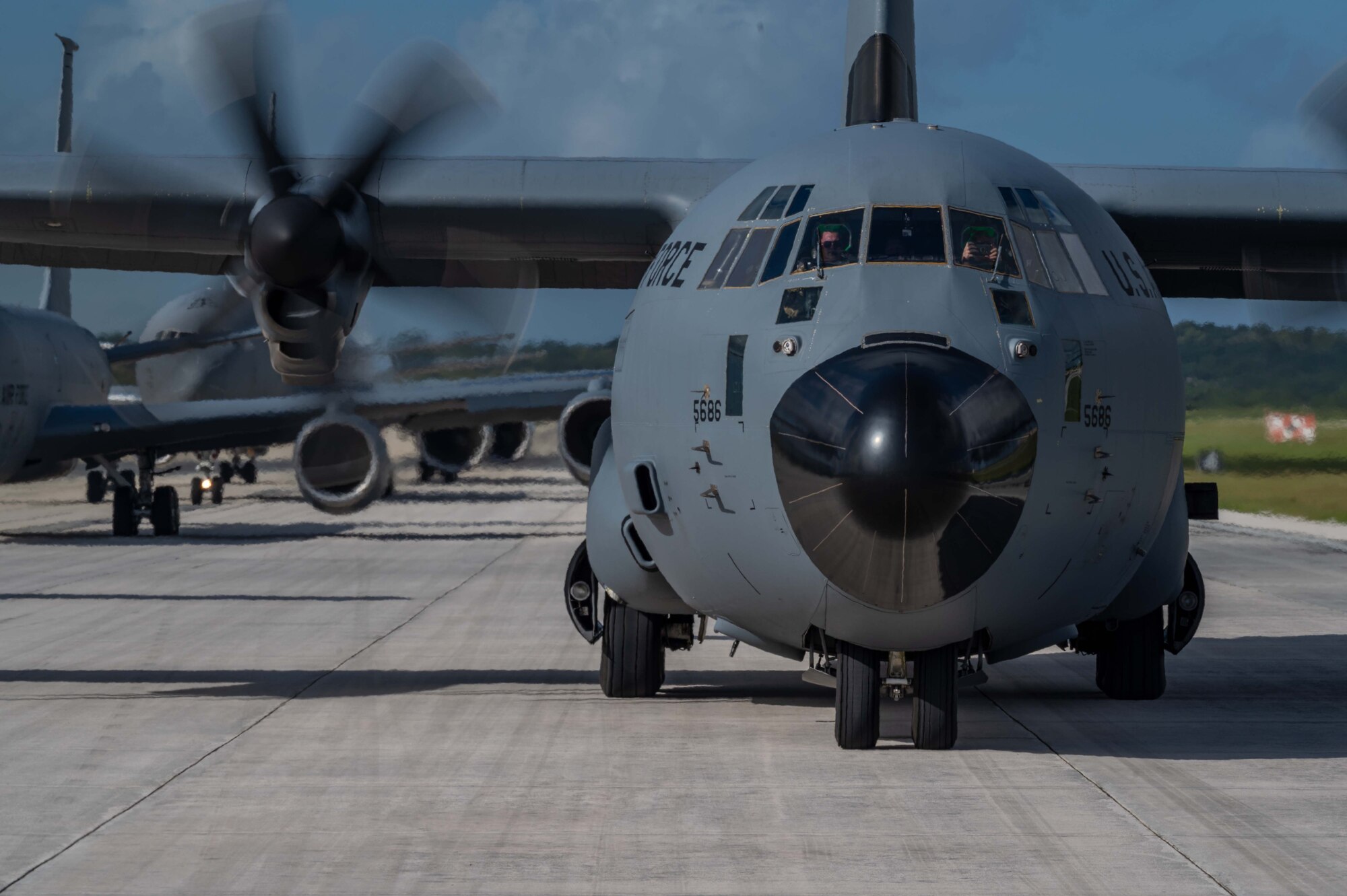 Royal Australian Air Force, U.S. Air Force, and the Japan Air Self-Defense Force aircraft participate in an elephant walk, during exercise Cope North 22 at Andersen Air Force Base, Guam, Feb. 5, 2022.