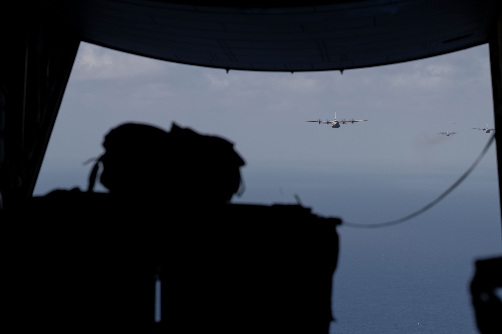 Cargo awaits exit out of a C-130J Super Hercules during exercise Cope North 22 over Tinian in the Northern Mariana Islands, Feb. 5, 2022.