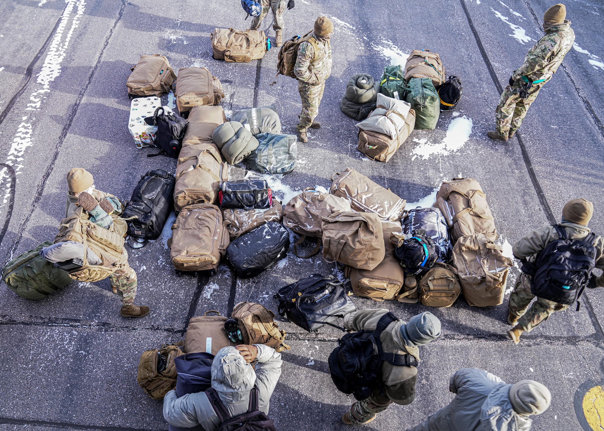 Members assigned to the 6th Air Refueling Wing unload cargo from a KC-135 Stratotanker aircraft during North American Aerospace Defense Command's (NORAD) Operation Noble Defender (OND), March 15, 2022.