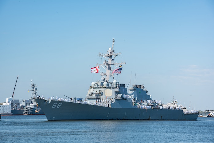 The Arleigh Burke-class guided-missile destroyer USS The Sullivans (DDG 68) departs from Mayport basin for deployment.