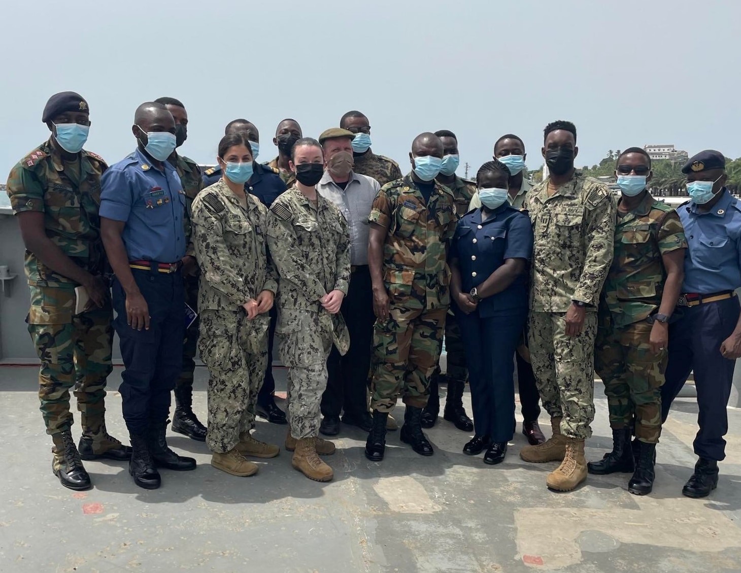 Personnel assigned to U.S. Naval Forces Europe and Africa (NAVEUR/NAVAF) Force Medical pose for a photo with Ghanian Armed Forces medical staff and students during a five-day Traveling Contact Team (TCT) event in support of Exercise Obangame Express 2022 (OE 22).