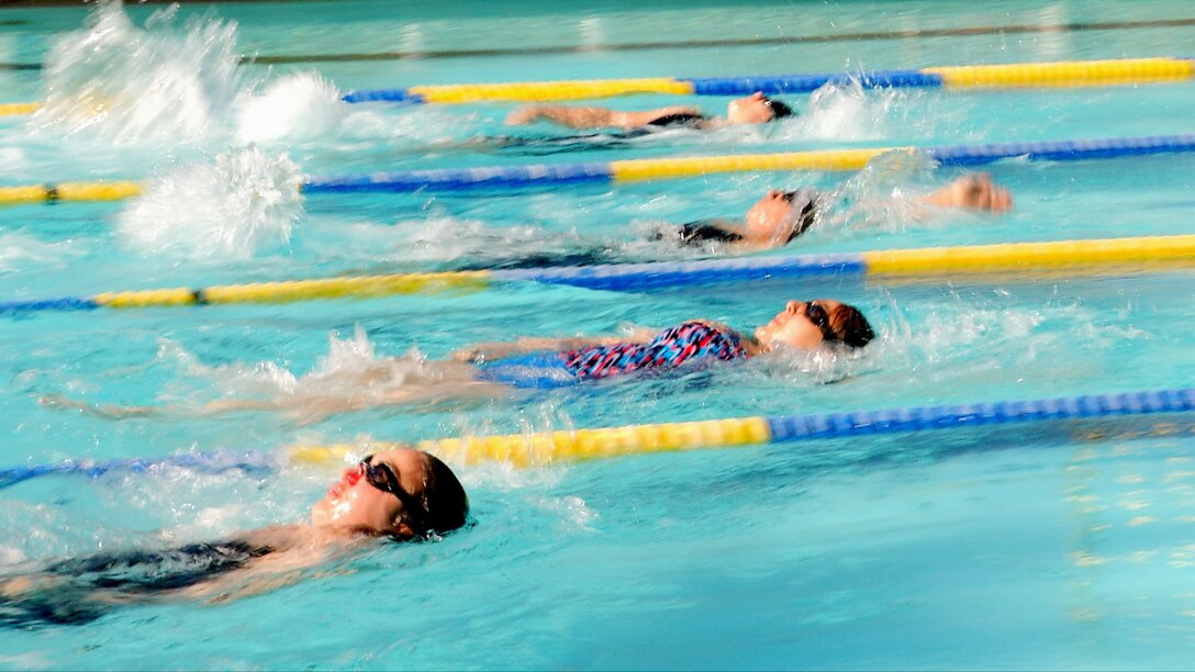 Wounded warrior compete in a swimming competition.
