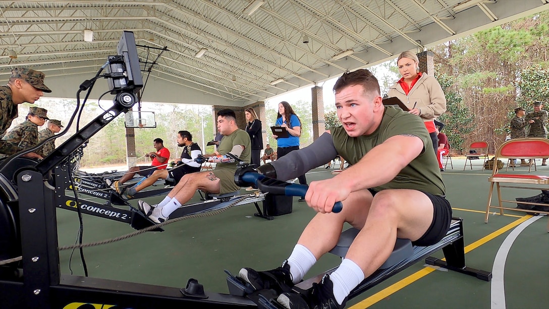 Wounded warrior compete in indoor rowing.