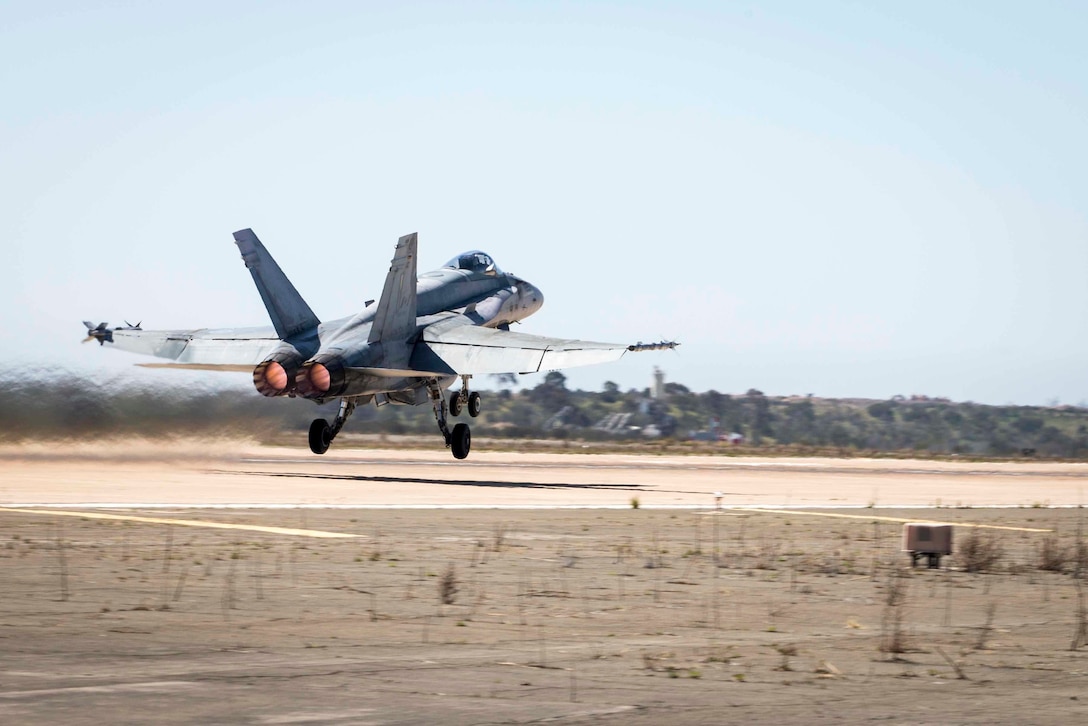 Canadian pilots with the Royal Canadian Air Force’s 410 Tactical Fighter Operational Training Squadron take off with their CF-18 Hornet on Marine Corps Air Station Miramar, San Diego, California, March 9, 2022. The 410 Tactical Fighter Operational Training Squadron visited MCAS Miramar to conduct fighter-training operations. (U.S. Marine Corps photo by Lance Cpl. Jose S. GuerreroDeLeon)