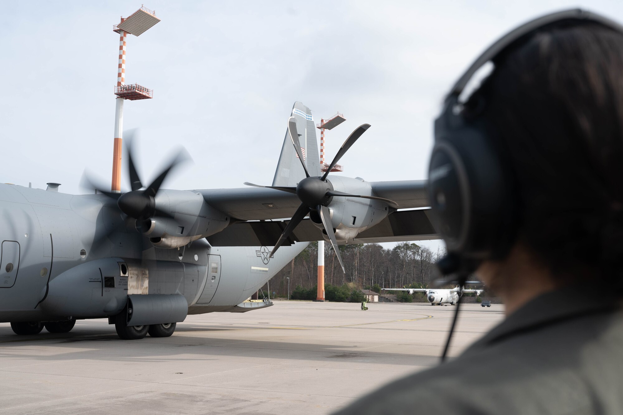 An Airman checks a C-130J Super Hercules's propellers at Ramstein Air Base.