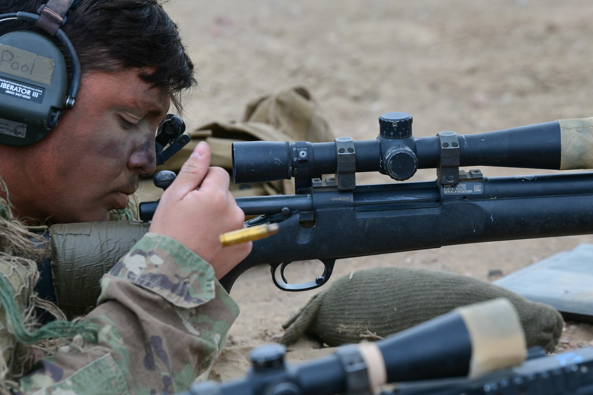 an airmen ejects a cartridge
