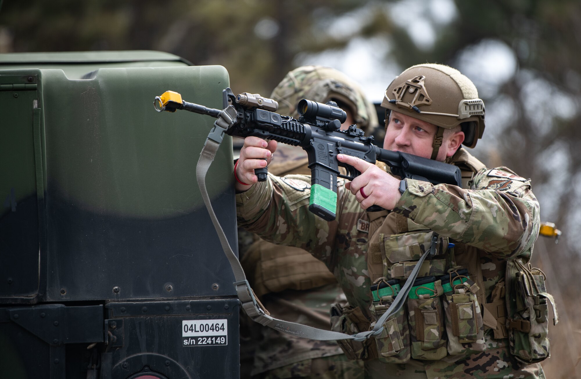 Airmen assigned to the 8th Security Forces Squadron collect and debrief after participating in simulated ground attack training at Kunsan Air Base, Republic of Korea, March 10, 2022.